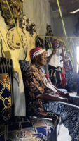 • Chief Apugo performing the new yam festival rites