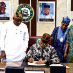 •Gov. Abiodun signing the Bill