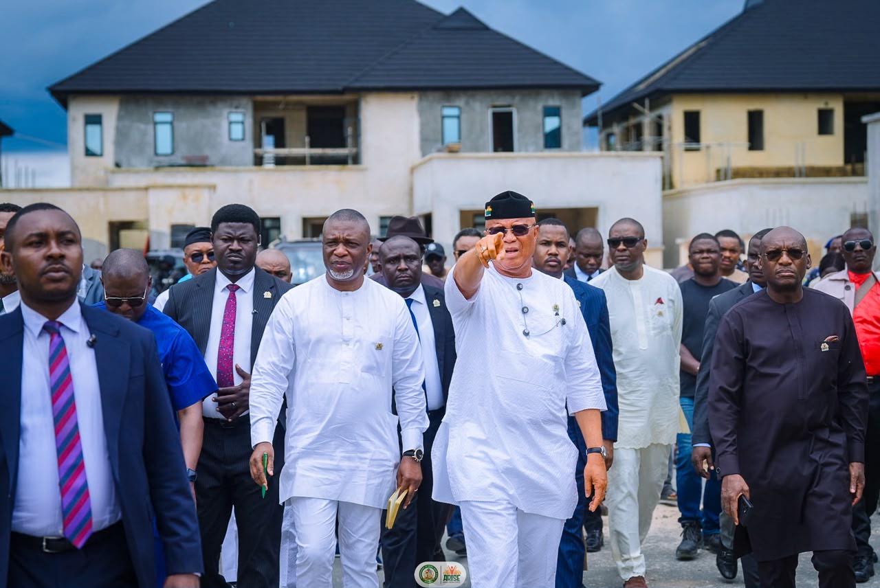 Gov Eno (middle right)Commissioner for Special Duties (mid left ) Mr Emem Bob during inspection at Ewet Garden Estate in Uyo
