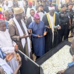 Senator Solomon Olamilekan Adeola offering prayers at the graveside of late Hassan Taiwo Ogogo, in Ilaro, on Tuesday, September 8, 2026
