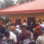Gen Koko Essien in the midst of community leaders during the handover of the renovated classroom blocks to mgt of AME Zion Primary School, Ndon Ebom, Uruan LGA