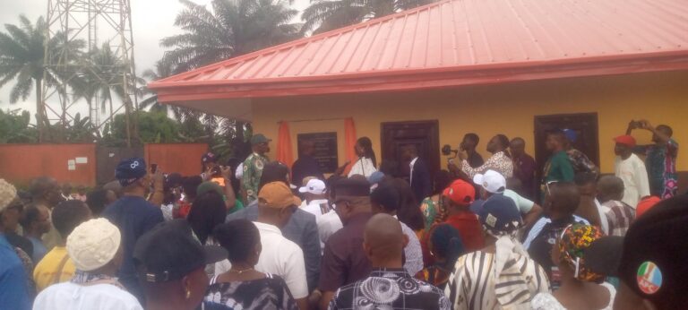 Gen Koko Essien in the midst of community leaders during the handover of the renovated classroom blocks to mgt of AME Zion Primary School, Ndon Ebom, Uruan LGA