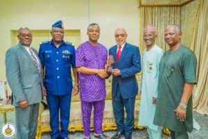 L-R Mr Brian Ojibe; Air Cde Adedoyin, Director Veterans Admin,NAF; Air Marshal S.K. Aneke, Chief of the Air Staff NAF; Captain August Okpe; Air Cde Sani Zachary (retd), Veterans Liaison Officer; Air Vice Marshal Garba Bello. On the occasion when the Nigerian Air Force High Command honored Captain August Okpe, the last surviving most senior pioneer Pilot of the NAF, for his contributions to the Military and Civil Aviation of Nigeria