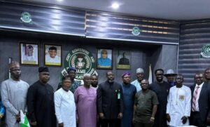 JAMB Registrar Prof. Segun Aina (middle) and members of the newly inaugurated committee.