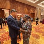 Chinese President Xi Jinping (l), with the Director-General of the World Trade Organisation, Dr Ngozi Okonjo-Iweala on the sidelines of the 18th BRICS Summit in New Delhi, India