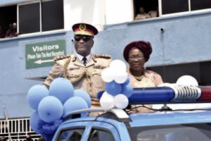 ACM Ogungbemide being pulled out of service at the FRSC headquarters, Abuja. With him is his wife, Ifeyinwa