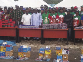 Chief of Staff to Senator Onyewuchi Ezenwa, Chika Emerald Alozie (3rd left), in a group photograph with the beneficiaries