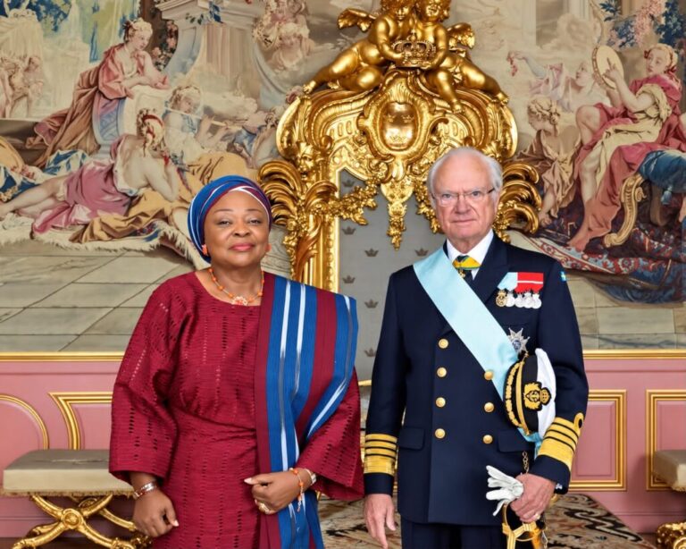 Ambassador Lola Akande and King Carl XVI Gustaf of Sweden.
