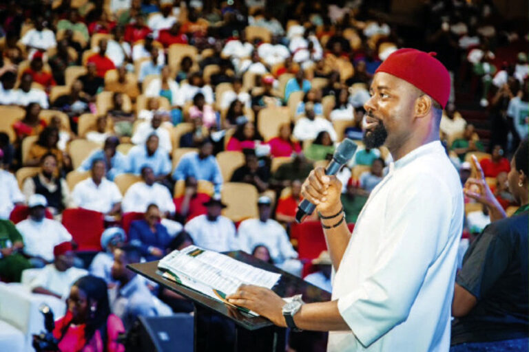 Peter Eze addressing participants at the event