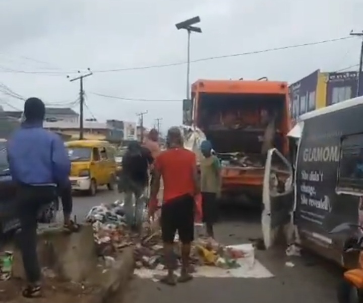 waste compactor truck accident