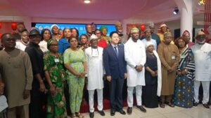 Front row: The Cultural Counsellor, China Cultural Centre in Nigeria, Yang Jianxing (m), the Director General/Chief Executive Officer of the National Institute for Hospitality and Tourism (NIHOTOUR), Abisoye Fagade (5th r), and other dignitaries and participants at the Seminar on China’s Tourism Development Experience in Abuja