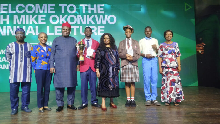 L-R: Falana, One, Bishop Okonkwo and wife, winners of essay competition and Prof. Akachi Ezeigbo at the lecture