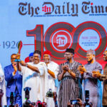 Secretary to the Government of the Federation,  George Akume, (3rd L) displaying a plaque as important dignitaries applauded in admiration at the unveiling of The Nigerian Grand Book at the DTN@100 Centenary Celebration in Abuja