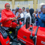 Wife of the Vice President Hajia Nana Shettima, (representing the First Lady of Nigeria) driving one of the tractors at the Launch of the Agri360 Mechanisation Training Initiative for Women and Youth at the Conference Hall of the State House Abuja on Wednesday 9th September, 2026
