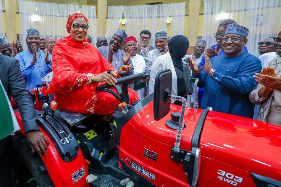 Wife of the Vice President Hajia Nana Shettima, (representing the First Lady of Nigeria) driving one of the tractors at the Launch of the Agri360 Mechanisation Training Initiative for Women and Youth at the Conference Hall of the State House Abuja on Wednesday 9th September, 2026