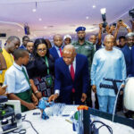 • Gov. Mbah interacting with students at anevent in the state