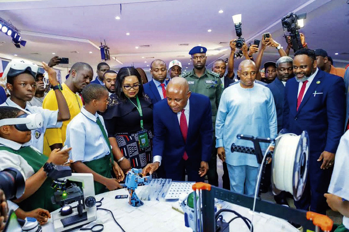 • Gov. Mbah interacting with students at anevent in the state