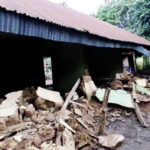 •One of the homes destroyed by floods.