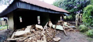 •One of the homes destroyed by floods.