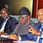 Managing Director and Chief Executive Officer of National Credit Guarantee Company (NCGC) Bonaventure Okhaimo, briefs State House Correspondents at the Press Gallery at the Presidential Villa while Special Adviser to the President on Information and Strategy, Bayo Onanuga and other members of NCGC delegation looked one.