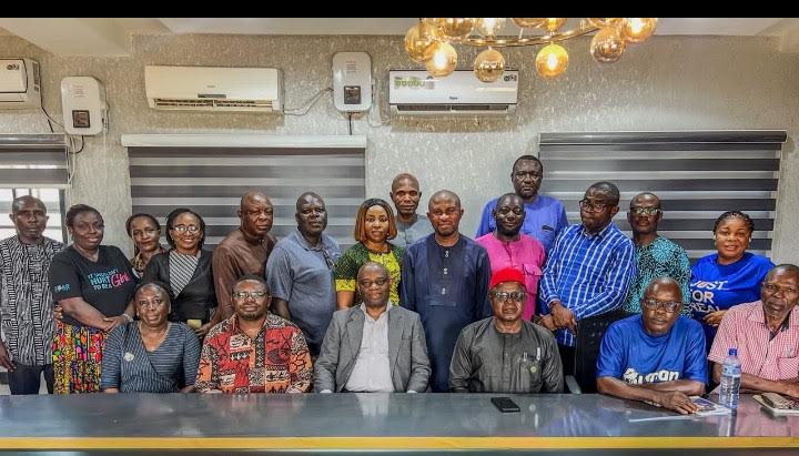 The State Attorney General and Commissioner for Justice, Prof. Yangien Ornguga flanked by members of the Correspondents' Chapel and his management team