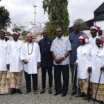 Apugo (middle) flanked by the Ndume Council of Elders.