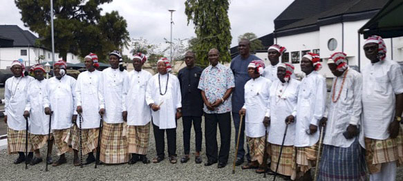 Apugo (middle) flanked by the Ndume Council of Elders.