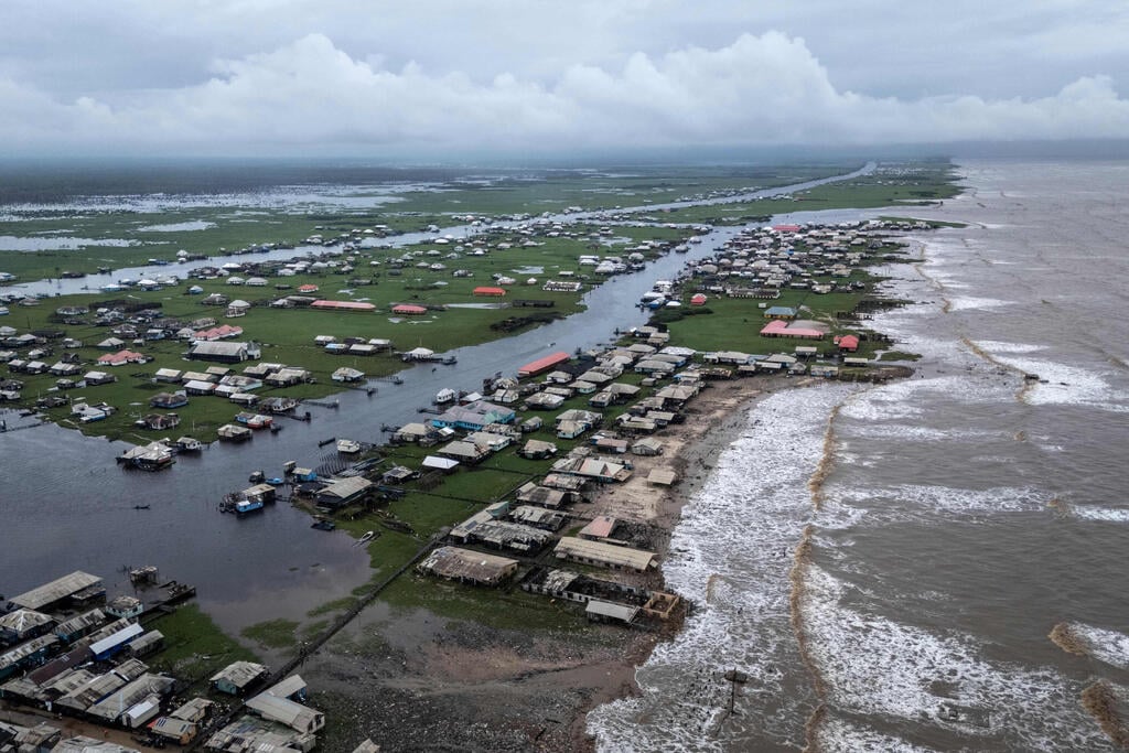 Atlantic Ocean waves washing over the town of Ayetoro, Ondo State (Photo: Olympia de Maismont/AFP)