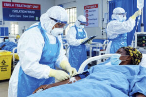 Health workers treating a patient. Photo- AI-generated