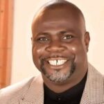 PDP Chieftain Hon. Emmanuel Blessed Onah, first Defendant