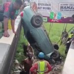 Car plunges into canal in Lagos