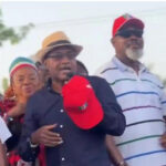Venatius Ikem, addressing supporters during the rally and flanked by Chief of Staff to the governor, Hon. Emmanuel Ironbar