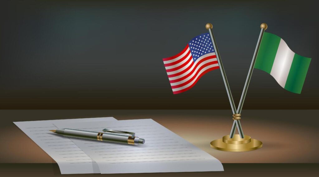us-nigeria-flags-notepad-pen-image-vector