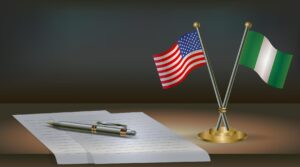 us-nigeria-flags-notepad-pen-image-vector